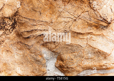 Orange gefärbten Stein Oberflächenstruktur. Stockfoto