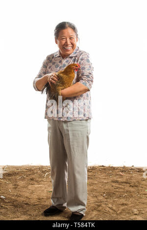Landwirte mit Hühner und Eier Stockfoto