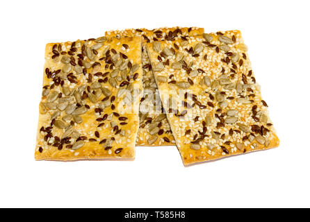 Isolieren von drei Cookies auf einem weißen Hintergrund. Diätetische Getreideerzeugnisse, Kekse, Lean mit Sesam, Sonnenblumen, Leinsamen. Stockfoto