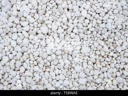 Hintergrund der vielen großen und kleinen weissen Steinen Stockfoto