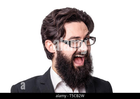 Lustig aussehenden Geschäftsmann an Kamera und winking, auf weißem Hintergrund Stockfoto