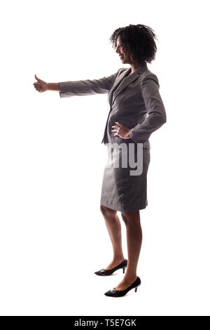 Seitenansicht eines Schwarzen Geschäftsfrau, die Gestik, die Genehmigung durch einen Daumen nach oben Aktion Stockfoto