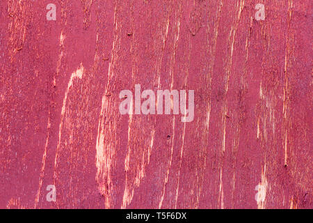Rotes Holz Zaun durch Zeit Textur Hintergrund verschlechtert. Stockfoto