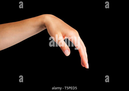 Frau, offene Hand oder etwas Holding auf schwarzem Hintergrund. Mit Freistellungspfad isoliert. Stockfoto