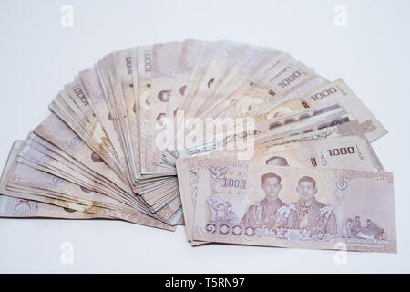 In der Nähe von Thai geld Banknoten closeup Hintergrund, Thailand Geld für Business, Münzen. 1000 Aufgabe butts Stockfoto