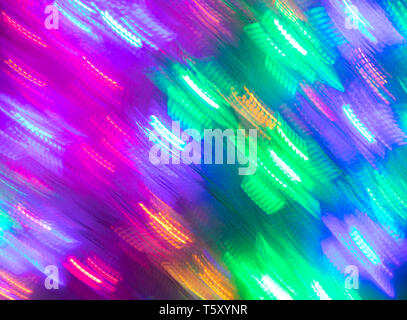 Abstrakte leuchtende nahtlose Hintergrund des unscharfen Neonlicht. Stockfoto