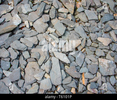 Alte Stücke von Schiefer an einem stillgelegten Schiefergrube in Cumbria, Großbritannien Stockfoto