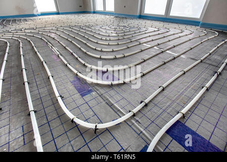 Fußbodenheizung in neu erbaute Wohnhaus Stockfoto