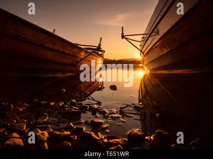 Golden Sunset am Waterhead am Lake Windermere in Ambleside, Lake District National Park, Cumbria England Großbritannien Stockfoto