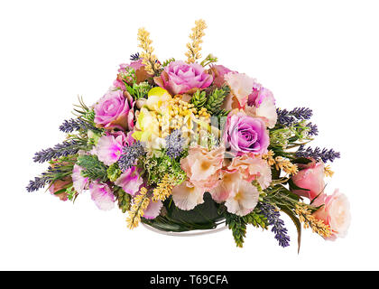 Blumenstrauß aus künstlichen Blumen Anordnung Mittelstück in Glasvase. Stockfoto