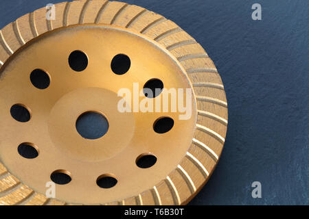 Der Diamant Schleifscheibe vor grauem Granit Hintergrund close-up. Stockfoto