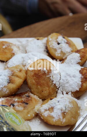 Lecker Poffertjes in Amsterdam Stockfoto