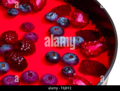 Red Käsekuchen mit Beeren Stockfoto