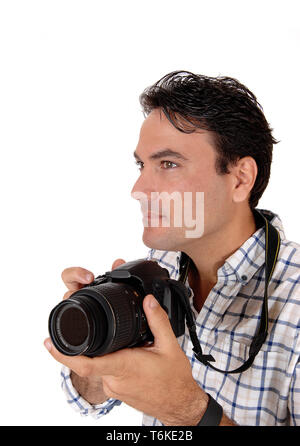 Ein stattlicher Mann mit seiner Kamera bereit für ein Shooting Stockfoto