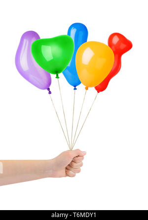 Bunte Luftballons in der hand Stockfoto