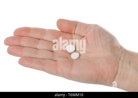 Hand mit Pillen Stockfoto