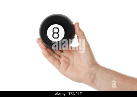 Hand mit Magic billardkugel Nr. 8 Stockfoto