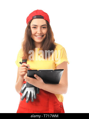 Mechanikerin in Uniform mit Zwischenablage auf weißem Hintergrund Stockfoto