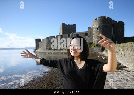 Internationale Studierende Tour rund um Nordirland, die meisten touristischen Hot Spots rund um County Antrim, Nordirland. Foto/Paul McErlane Stockfoto