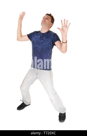 Junger Mann mit den Händen in der Luft Angst Stockfoto