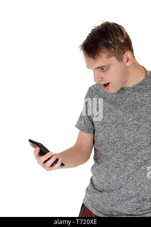 Junge Mann in seiner Zelle Telefon Fragen Stockfoto