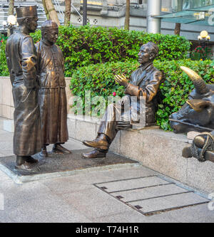 Bronze Skulptur der Fluss Kaufleute von Aw-T-Stück Hong Bildhauer entlang des Singapore River in der Innenstadt von Singapur. Stockfoto