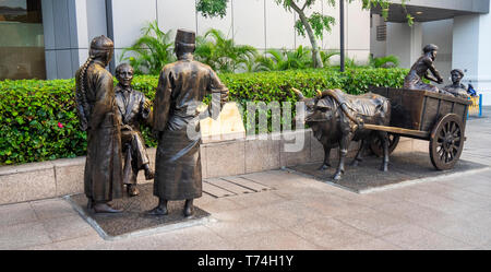 Bronze Skulptur der Fluss Kaufleute von Aw-T-Stück Hong Bildhauer entlang des Singapore River in der Innenstadt von Singapur. Stockfoto