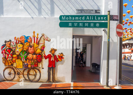 Street Art Wandbild an der Wand an der Seite eines shophouse Mohamed Ali Lane, die das tägliche Leben in Chinatown von Singapur. Stockfoto