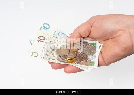 Einige Banknoten und Münzen des polnischen Zloty. Stockfoto