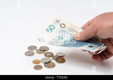 Einige Banknoten und Münzen des polnischen Zloty. Stockfoto