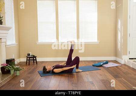 Yoga pose Eka Pada Urdhva Prasrta Padottanasana Stockfoto