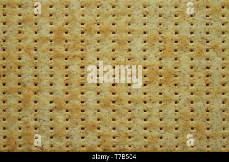 Blick von oben auf die jüdischen Fladenbrot matzo wie ein Hintergrund. Trendy Textur. Essen Konzept. Stockfoto