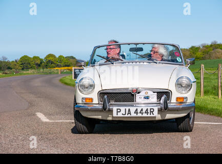 Classic Vintage 1976 MG cabrio Sportwagen Archerfield Immobilien, North Berwick Rotary Club Oldtimer Tour 2019, East Lothian, Schottland, Großbritannien Stockfoto