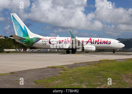 Simpson Bay, Saint Martin. 7 Dez, 2016. Eine Caribbean Airlines Boeing 737-800 am Flughafen Princess Juliana gesehen. Credit: Fabrizio Gandolfo/SOPA Images/ZUMA Draht/Alamy leben Nachrichten Stockfoto