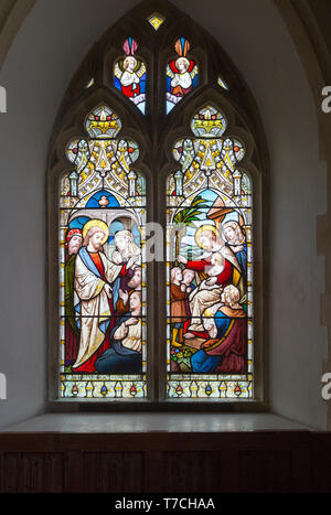 Glasfenster in der Kirche des Hl. Michael, Peasenhall, Suffolk, England, UK ca. 1868 von Ward und Huges zwei Panels Jesus Christus Heilung der sic Stockfoto