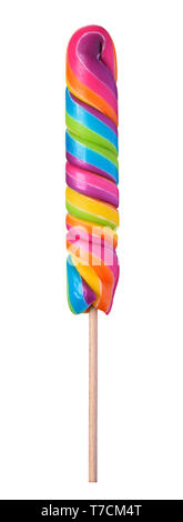 Lollipop swirl Candy auf Holzstab grossen leuchtenden Regenbogenfarben auf weißem Hintergrund Stockfoto