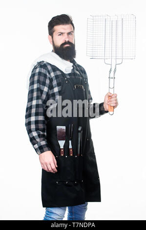 Grid ist perfekt für ihr Lieblingsessen. Bärtiger Mann mit Grill Gitter in der Hand. Hipster holding Edelstahl Grill Gitter. Grill kochen mit Metallgitter für das Grillen Grill. Stockfoto