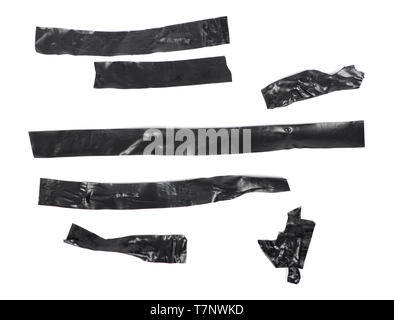Sammlung von schwarz selbstklebend Isolierband Stücke auf weißem Hintergrund Stockfoto