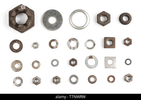 Verschiedene alte und rostige Muttern und Unterlegscheiben. Stockfoto