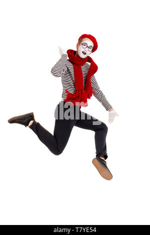 Volle Länge Portrait von mime-Künstlerin auf weißem Hintergrund springen Stockfoto