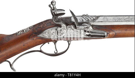 Ein Deutscher flintlock Gewehr, circa 1720. Orientalische zweistufige Zylinder mit glatter Bohrung 16,5 mm Kaliber, achteckige dann Runde nach einem Gürtel. Graviert cannon Schnauze, den oberen Bereich des Spritzenzylinders gemeißelt am Hinterteil und am Gürtel als auch mit Gravur auf der Rückseite. Fein graviertem flintlock unterzeichnet auf der Sicherungsplatte unter der Pfanne" Paul: lienhart München'. Die Lager mit gemeißelten und gravierte Eisenmöbel und silbernen Wappenschild mit aristokratischen Wappen. Holz- ladestock mit eisernen Spitze und bullet Abzieher. Das Fass nicht Teil des ursprünglichen, einige Schrauben a, Additional-Rights - Clearance-Info - Not-Available Stockfoto