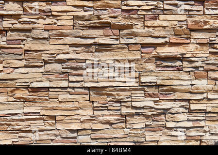 Gestapelte stein Wand Hintergrund horizontal. Stockfoto