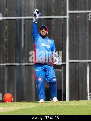 Das Grange, Edinburgh, Midlothian, Großbritannien. 10. Mai 2019. Schottland v Afghanistan ODI. Bild zeigt: Afghanistans Mohammad Shahzad, Beschwerden während des ersten Innings wie Schottland nehmen auf Afghanistan in einer eintägigen internationalen im The Grange, Edinburgh Credit: Ian Jacobs/Alamy leben Nachrichten Stockfoto