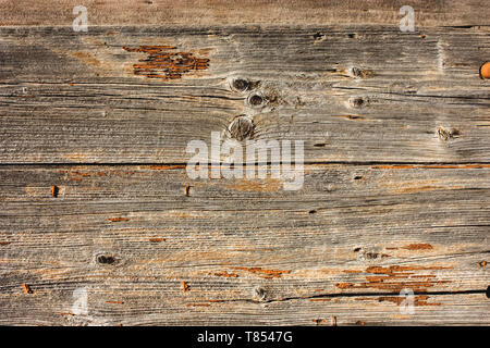 Mauer, Zaun von alten, braunen Brettern. Grunge, rustikale Hintergrund Stockfoto