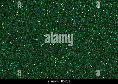 Dunkelgrünen Hintergrund mit Glitzer. Helle exklusive Textur, Muster. Stockfoto