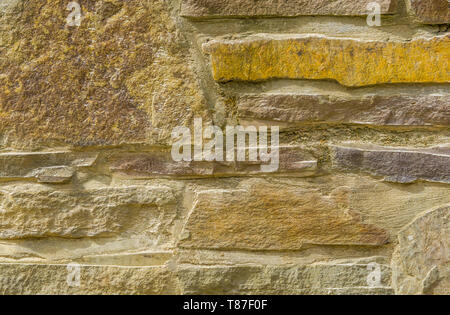 Hintergrund Muster der modernen Steine in verschiedenen Größen und Formen, Architektur Detail einer Steinmauer Stockfoto