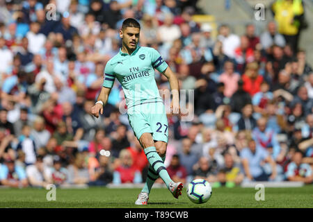 Burnley, Großbritannien. 12. Mai 2019. Konstantinos Mavropanos von Arsenal in Aktion. Premier League match, Burnley v Arsenal in Turf Moor in Burnley, Lancashire am Sonntag, den 12. Mai 2019. Dieses Bild dürfen nur für redaktionelle Zwecke verwendet werden. Nur die redaktionelle Nutzung, eine Lizenz für die gewerbliche Nutzung erforderlich. Keine Verwendung in Wetten, Spiele oder einer einzelnen Verein/Liga/player Publikationen. Credit: Andrew Orchard sport Fotografie/Alamy leben Nachrichten Stockfoto