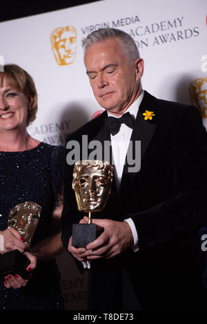 Huw Edwards in der Presse Zimmer im Virgin Media BAFTA TV Award, in der Royal Festival Hall in London statt. Stockfoto