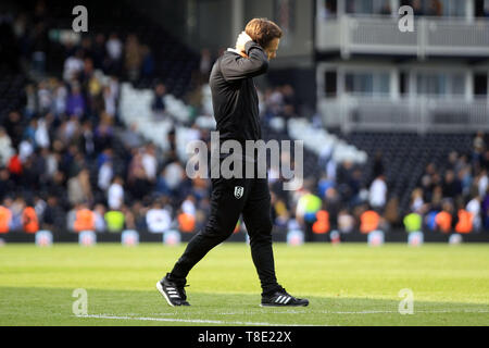 Eine niedergeschlagene Fulham Manager Scott Parker während der Runde der Wertschätzung. Premier League match, Fulham v Newcastle Utd im Craven Cottage in London am Sonntag, den 12. Mai 2019. Dieses Bild dürfen nur für redaktionelle Zwecke verwendet werden. Nur die redaktionelle Nutzung, eine Lizenz für die gewerbliche Nutzung erforderlich. Keine Verwendung in Wetten, Spiele oder einer einzelnen Verein/Liga/player Publikationen. pic von Steffan Bowen/Andrew Orchard sport Fotografie/Alamy leben Nachrichten Stockfoto