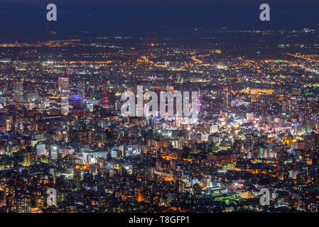 Nacht Stadtbild Blick auf Sapporo City vom Berg Moiwa Beobachtung. Die beliebtesten Reiseziele Sicht für den Tourismus. Stockfoto